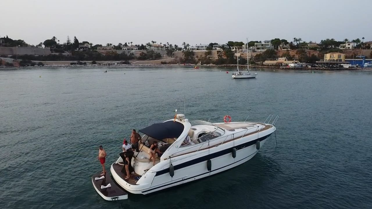 Professional sailing at sunset